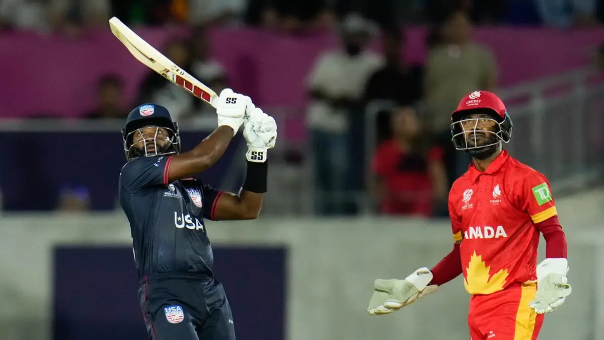 Aaron Jones of the USA cricket team hitting a six during a match against Canada in the ICC T20 World Cup 2024.